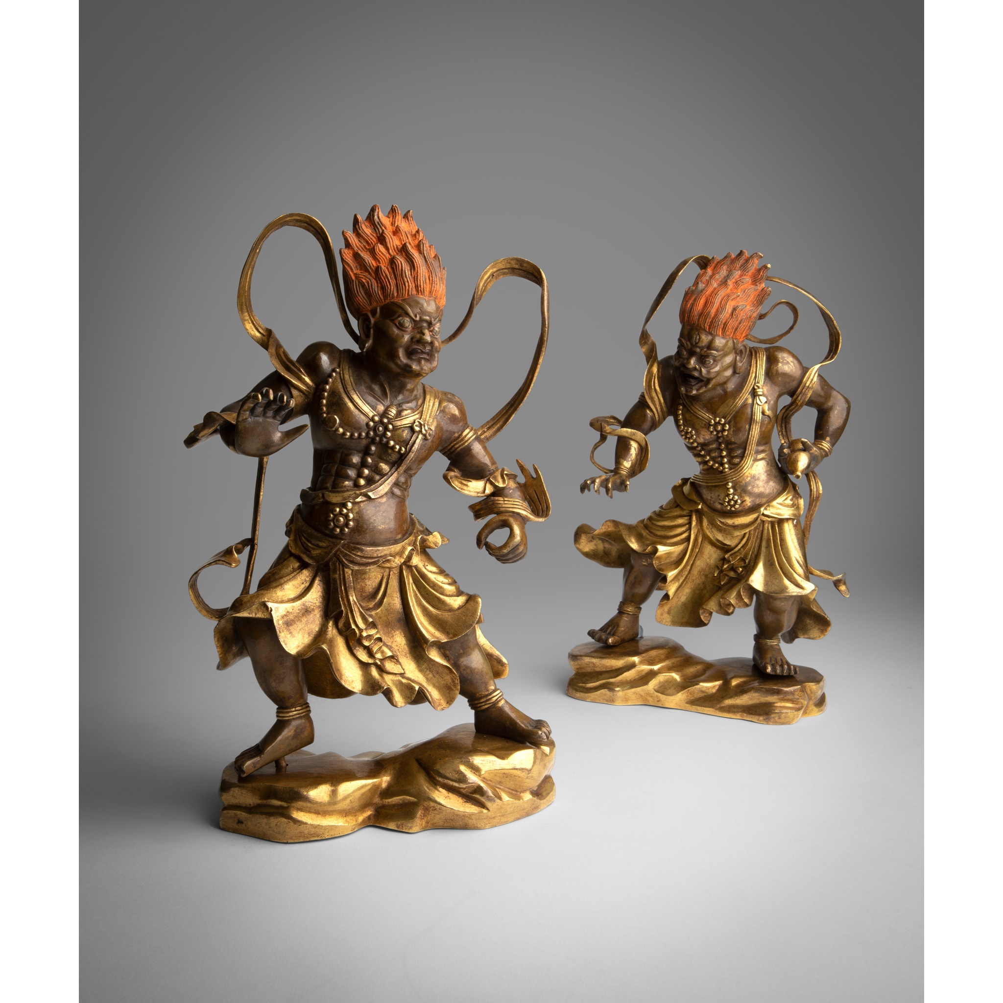 PAIR OF GILT BRONZE FIGURE OF TEMPLE GUARDIANS QING DYNASTY, 18TH CENTURY